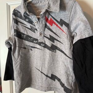 4T Kids long sleeve polo with Lightning and skull and bones design.